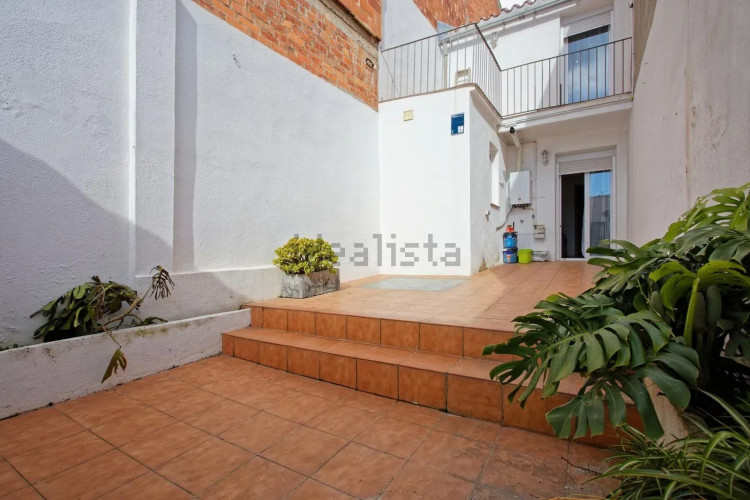 Chalet adosado en calle de Topete