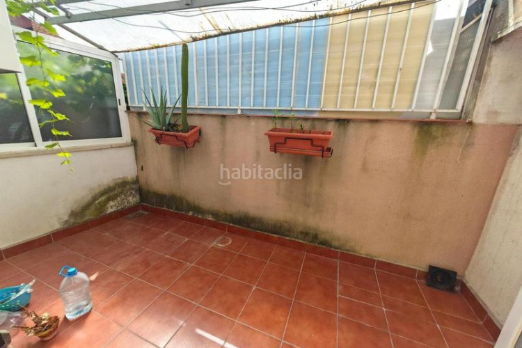Casa  ideal para dos familias con gran patio y terraza en la gripia en Terrassa