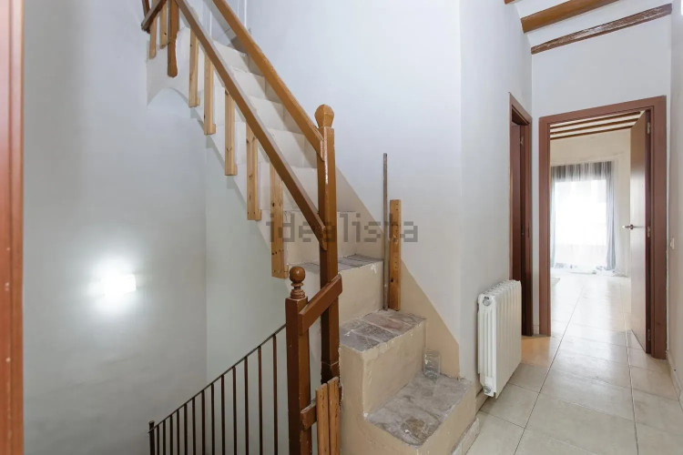 Chalet adosado en calle de Topete