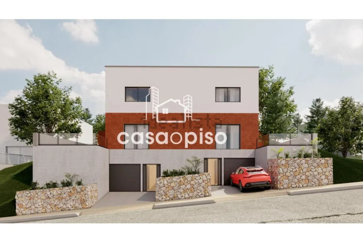 Chalet adosado en calle d'Amèrica